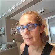 Profesora de inglés general y enfocada en negocios
